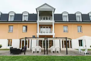 Photo de Residence Le Clos Fleuri
